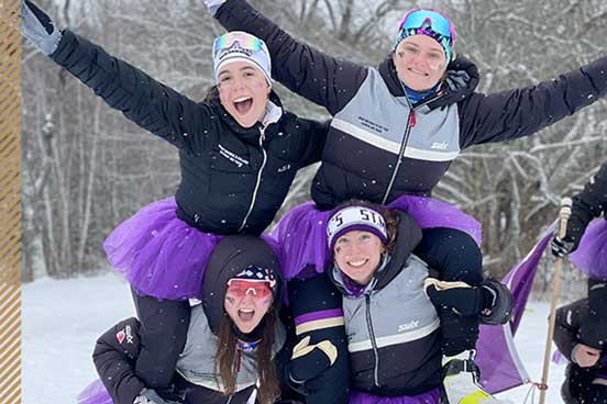 4 students in a snow